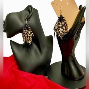 Skull snake skin print dangling earrings NWOT